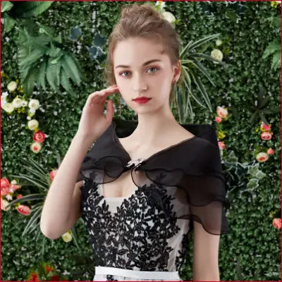 Elegant black lace dress with shawl.