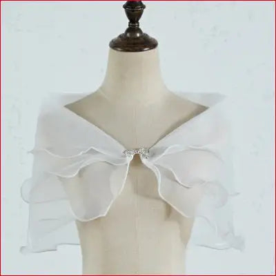 White ruffled bridal shawl with rhinestone clasp and removable shoulder straps for wedding dress