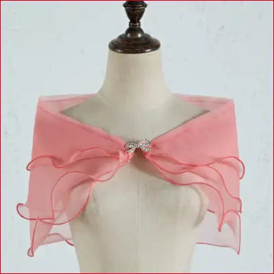 Pink ruffled bridal shawl with rhinestone clasp and removable shoulder straps for wedding decor
