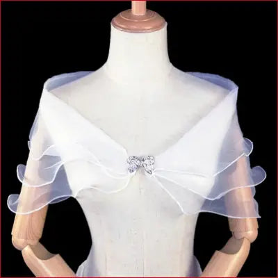 White sheer ruffled bridal shawl with removable shoulder straps for elegant wedding style