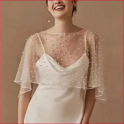 Beaded sheer capelet wedding shawl with floating veil for bridal photography