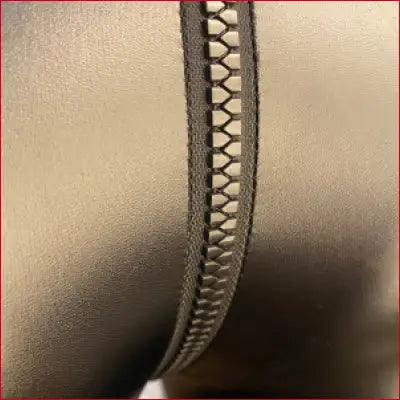 Zipper with interlocking metal teeth on Black Faux Leather Handmade Leggings with Crotch Zipper Triangle Design