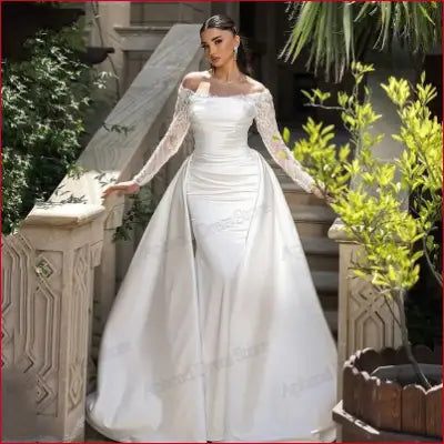 Elegant white wedding dress with satin fabric, full sleeves, and customizable shoulder measurement