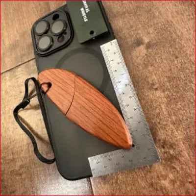 Black Phone with Wooden Case and Metal Frame Ruler featuring a Box Opener functionality