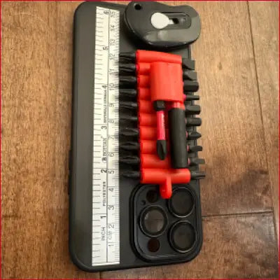 Multitool phone case with box cutter and screwdriver bits for iPhone 14 Plus Black Case