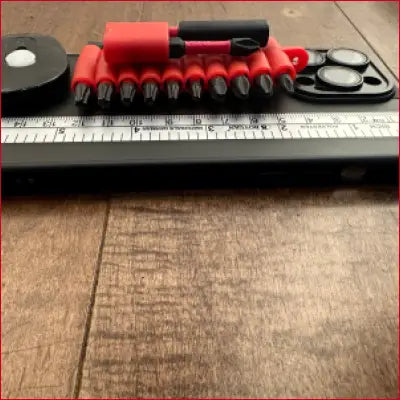 Screwdriver bit set with measuring ruler in black case suitable for box cutter tools