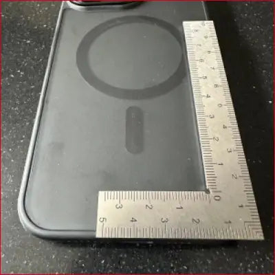 Black iPhone 14 Pro Max case with stainless frame and MagSafe ring for secure attachment