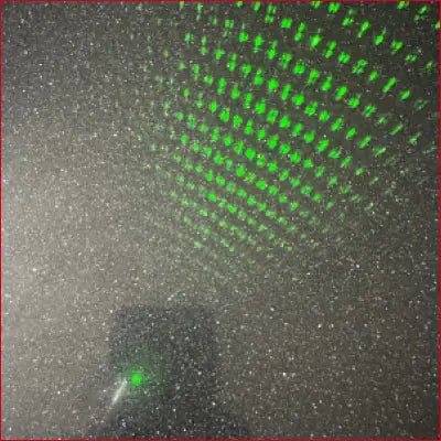 Green laser grid displayed on iPhone 15 Black Case Laser Pointer with crotch zipper