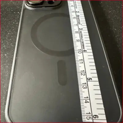 Black iPhone 15 Pro case with Silver Ruler and MagSafe ring feature