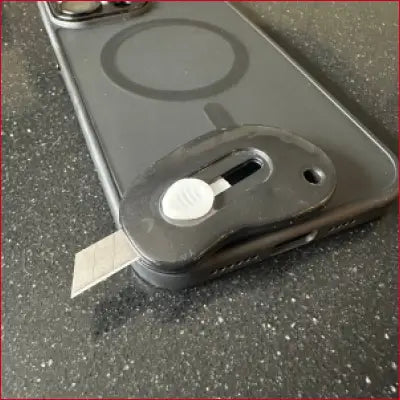 IPhone 15 Pro Max Black Case with Box Cutter Utility Knife attachment