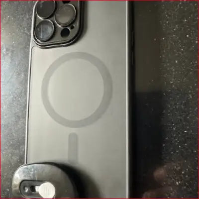 Gray Smartphone with MagSafe ring in iPhone 16 Plus Black Case Box Cutter