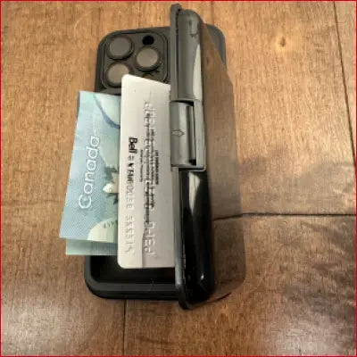 Black phone case wallet for iPhone 16 Pro Max with card holder functionality