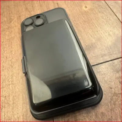 Black Smartphone with Battery Pack in iPhone 16 Pro Max Black Case Fixed Card Holder