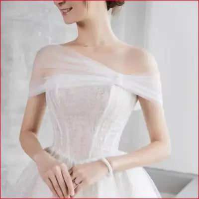 Elegant off-the-shoulder wedding dress with bling crystals in white black red tones