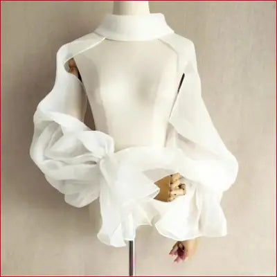 White high-neck blouse with sheer voluminous sleeves from the Organza Wedding Shrug collection