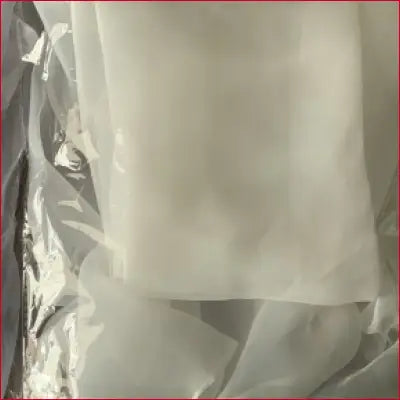Translucent white organza wedding shrug with high neck and puffy trumpet sleeves