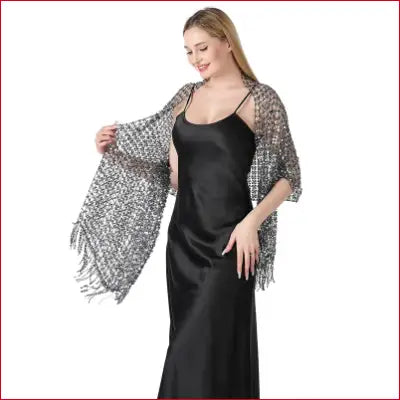 Woman in black dress with beaded shawl showcasing elegant 1920s scarf wraps for weddings