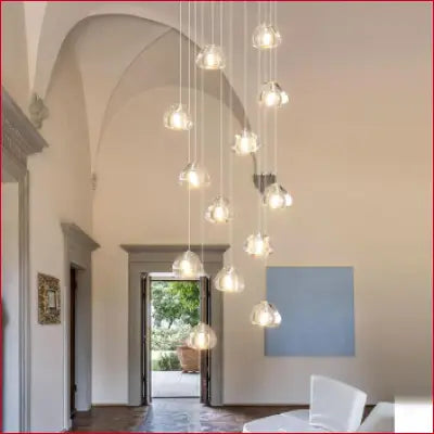 Multi-pendant glass chandelier showcasing modern LED crystal design for elegant ceilings