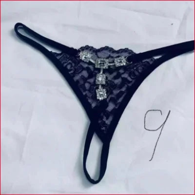 Black lace thong underwear featuring rhinestones thong crystals with jeweled pendant