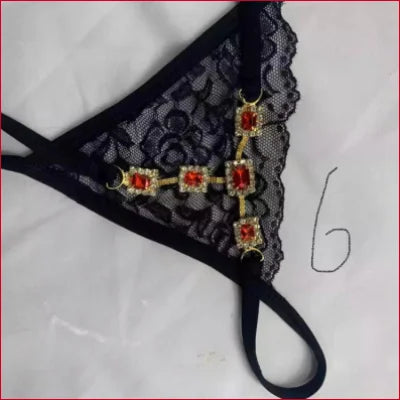 Black lace thong with gold and red jeweled cross in Rhinestones Thong Crystals