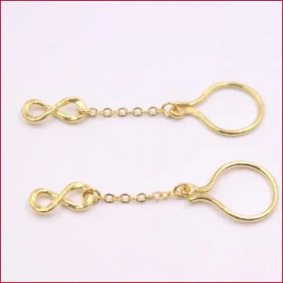 Gold-colored keychain with infinity symbol, showcasing 24k Pure Gold Hook Dangle Earrings