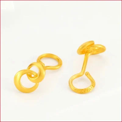 Gold earrings with curved abstract designs from 24K Pure Gold Intersecting Loops