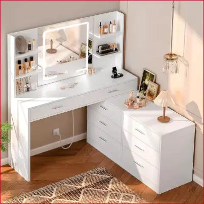 White corner vanity desk with LED lighted mirror and power outlet for modern makeup setup