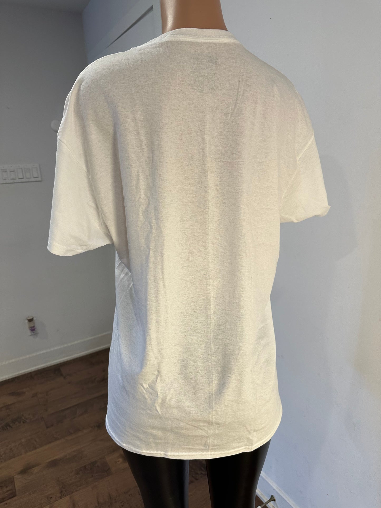 Handmade White V-Neck Cotton T-Shirt with Palm Tree Drawing on a mannequin torso