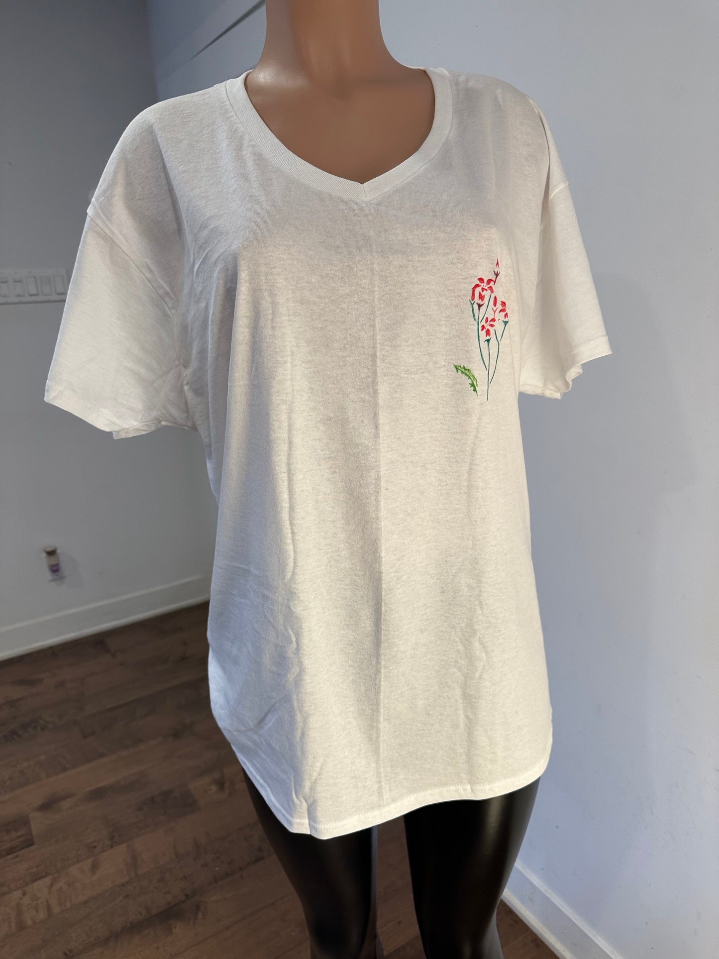 Handmade white v-neck cotton t-shirt featuring palm tree drawing on the chest