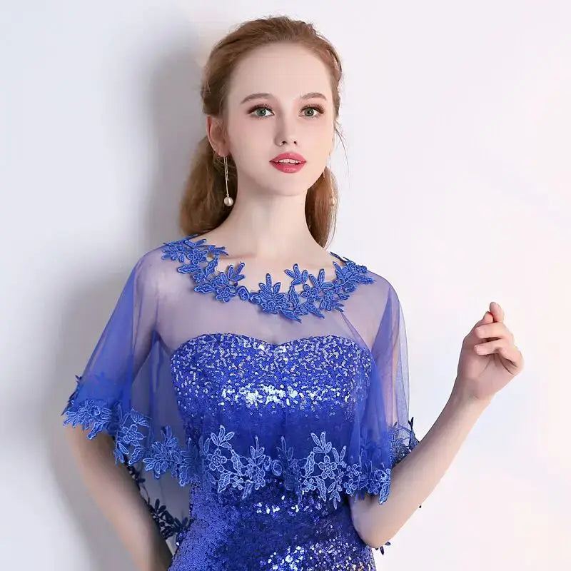 Blue sequined bridal evening dress with lace-trimmed pearl capelet and short wrap