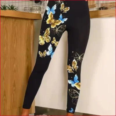 Black leggings with colorful butterfly patterns for comfort and performance in activewear