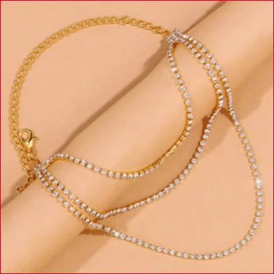 Delicate gold necklace with pearls, pairing beautifully with a Stylish Ankle Bracelet