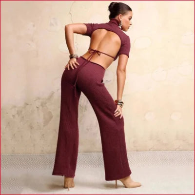 Maroon turtleneck cutout knitted two-piece outfit with cropped top and wide-leg pants