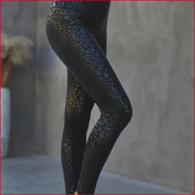 Black Leopard Women’s Leggings showcasing a textured, stylish design in sizes S-XL