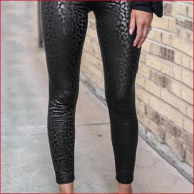 Shiny black textured leopard women’s leggings in snakeskin pattern available S-XL