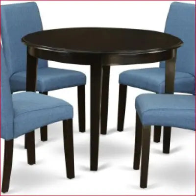 Round dark wood table with blue linen fabric chairs in BOBA5-CAP-21 kitchen table set