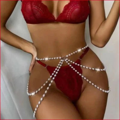 Red lingerie set featuring a faux pearls body waist chain for stylish outfits