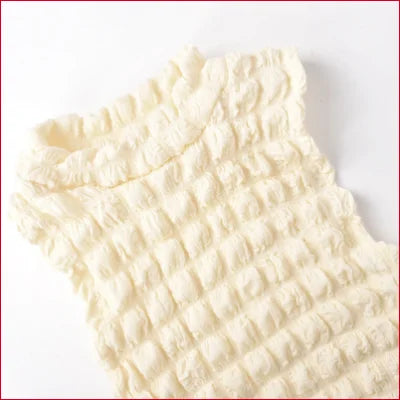 Cream-colored textured knitted fabric for a Chic Bodycon Asymmetrical Cocktail Dress