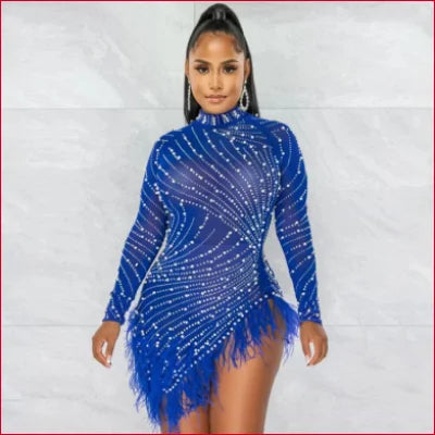 Vibrant blue sequined mini dress with feathered hem and long sleeves inspired by faux pearls sheer