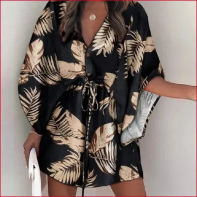 Tropical print bohemian batwing v-neck mini dress with tie waist and leaf pattern