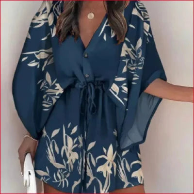 Blue floral Bohemian Batwing V-Neck mini dress with wide sleeves and cinched waist