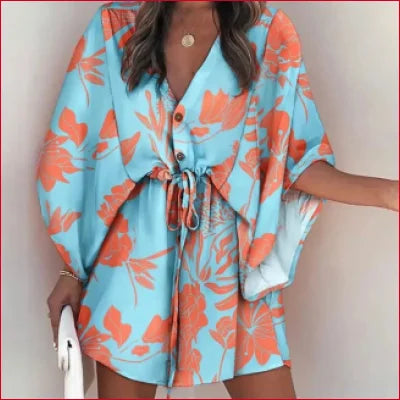 Floral-patterned bohemian batwing v-neck mini dress in turquoise and coral colors