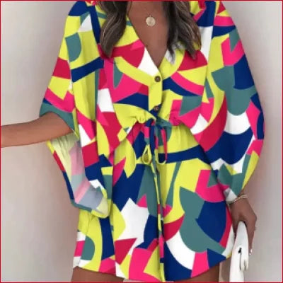 Colorful geometric bohemian batwing v-neck mini dress with wide sleeves and drawstring waist