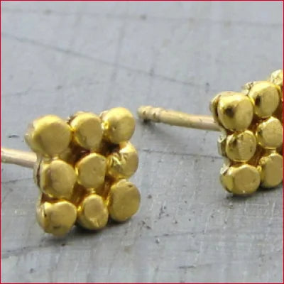 Gold stud earrings with clustered ball designs in solid 24k gold, perfect for boho style