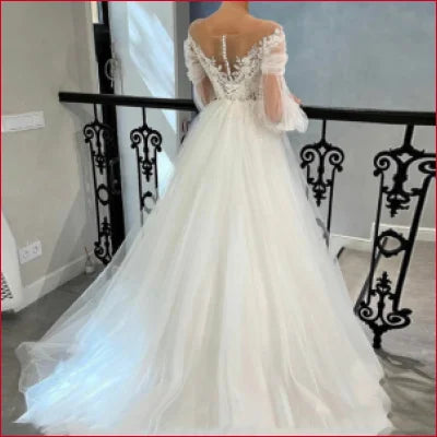 Elegant long sleeves bridal gown with lace and flowing tulle skirt in various colors