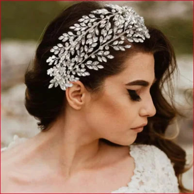 Ornate leaf-shaped crystal hair accessory for brides, featuring a bridal rhinestone headdress