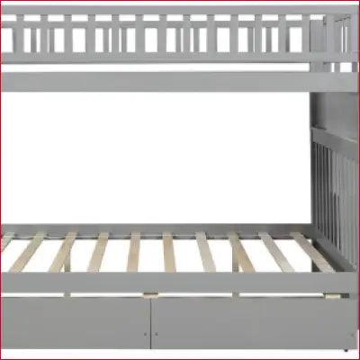 Gray wooden bunk beds made of solid wood with stairs and a slat kit for stability