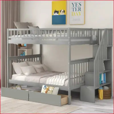 Gray wooden bunk beds featuring solid wood construction, storage stairs, and slat kit