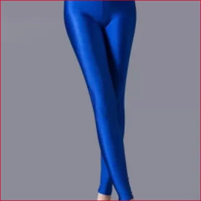 Bright blue camel toe spandex leggings showcasing a shiny, skin-tight design