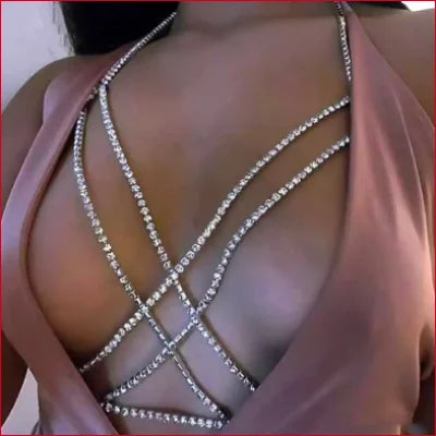 Sparkling chest rhinestones jewelry necklace over pink dress showcasing double breast style